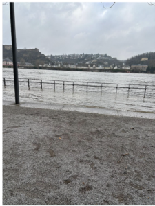 This is a photo where the Rhine River is flooding onto the path